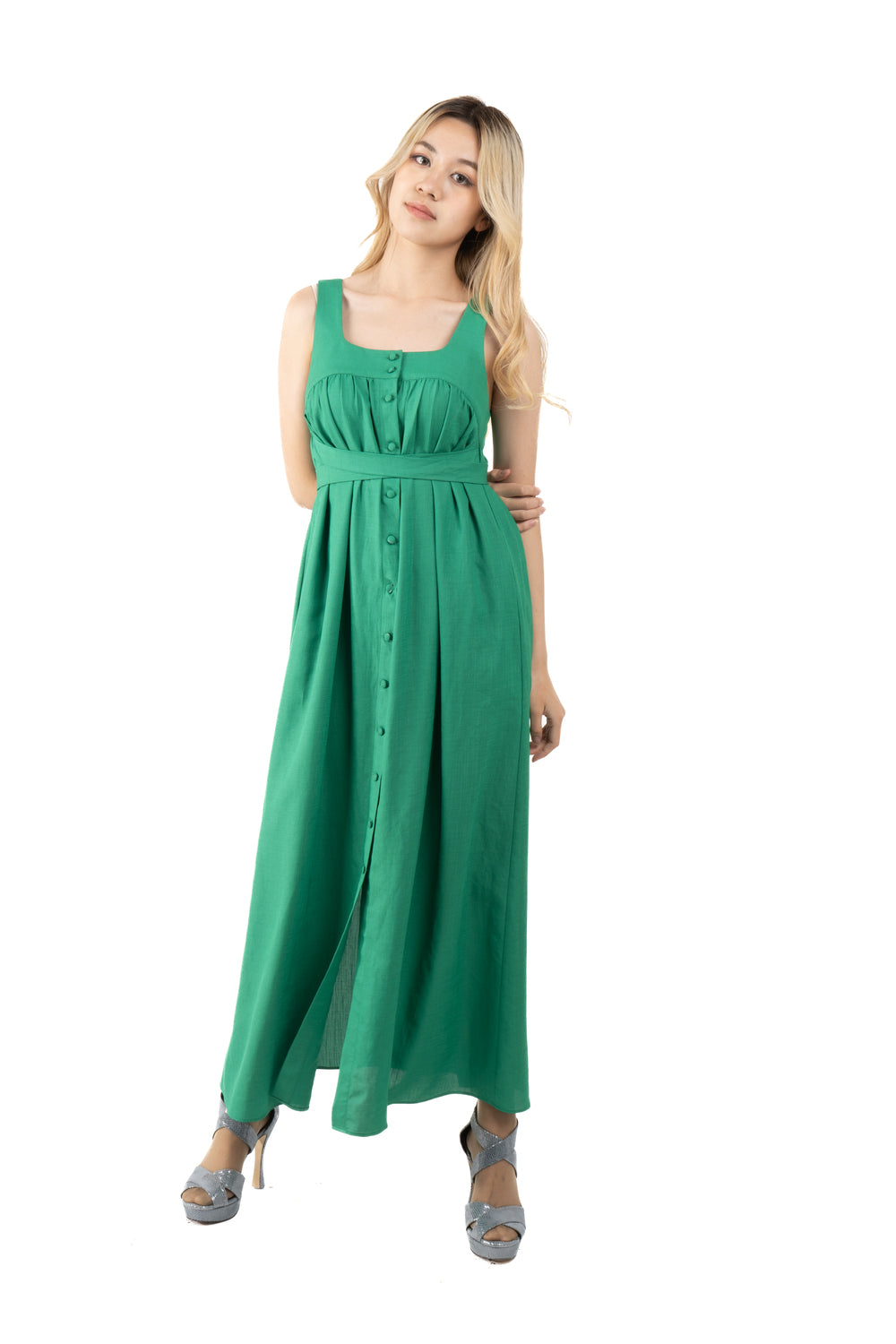 5305D Long green dress, no sleeves, button front and waist tie at the back.